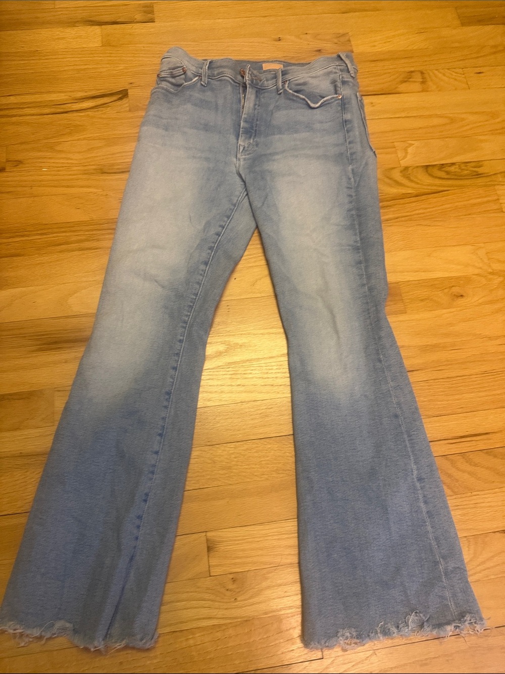MOTHER Light Blue Flare Jeans with Frayed Hem